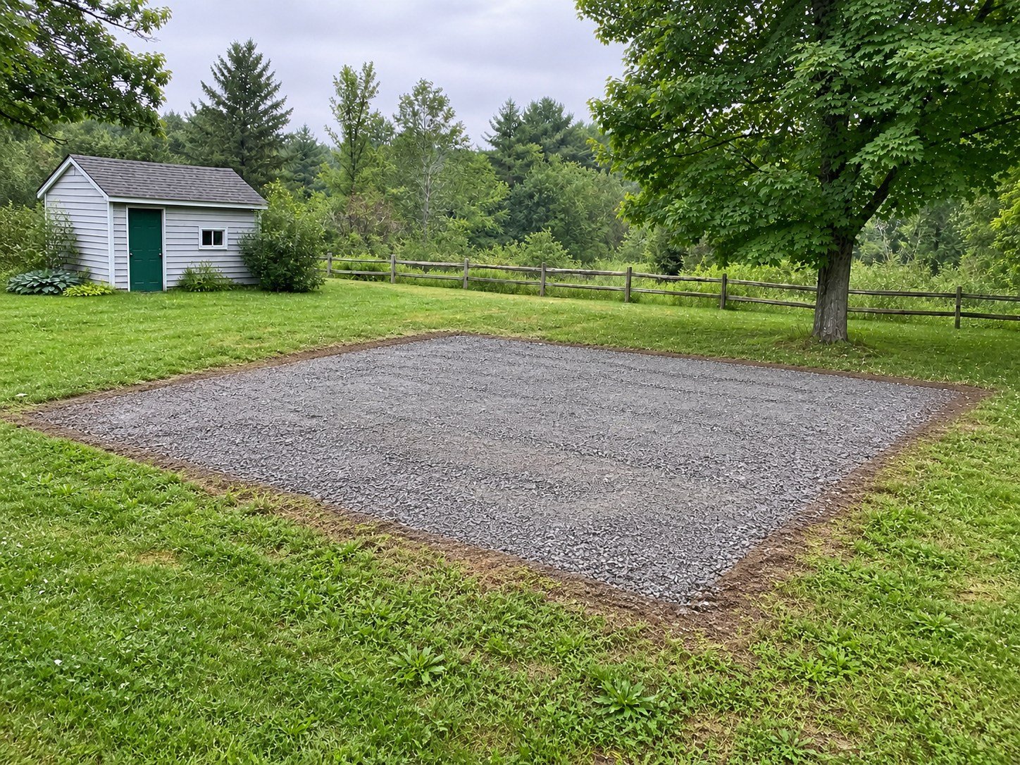 The same area after shallow excavation and aggregate pad preparation, ready for the next project phase.