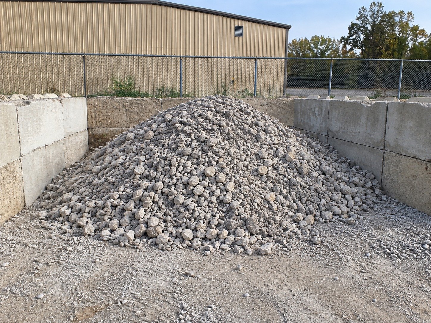 The same bay containing processed recycled concrete aggregate after crushing.