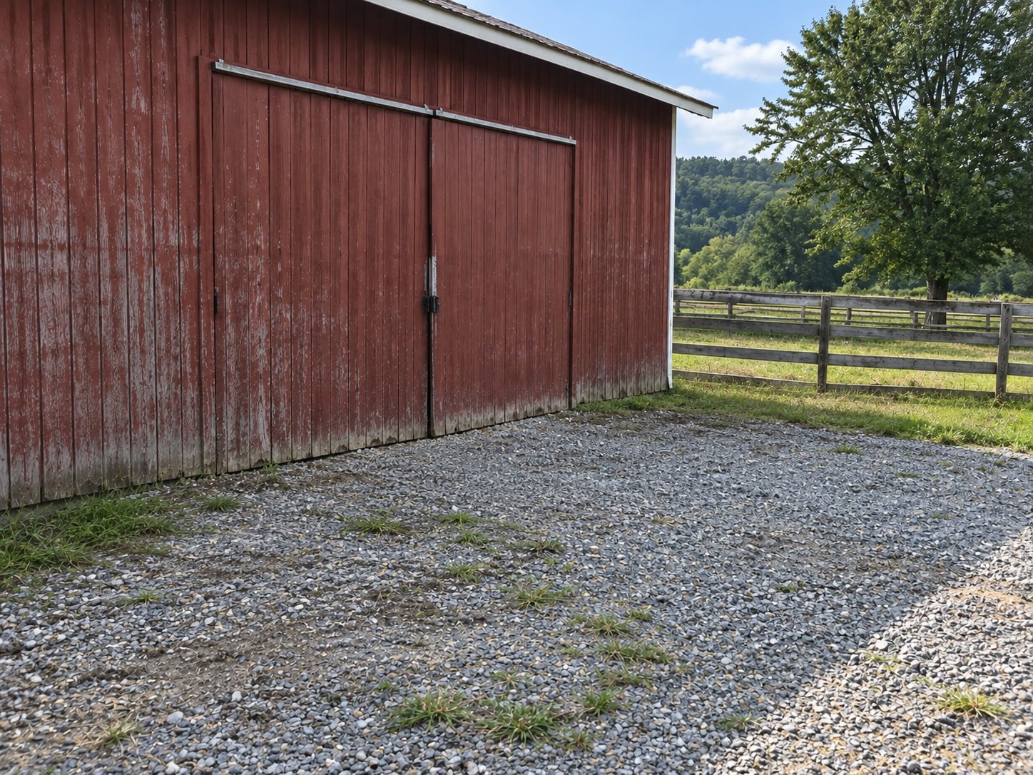 The same representative property after farm hauling, photographed from a nearby changed viewpoint.