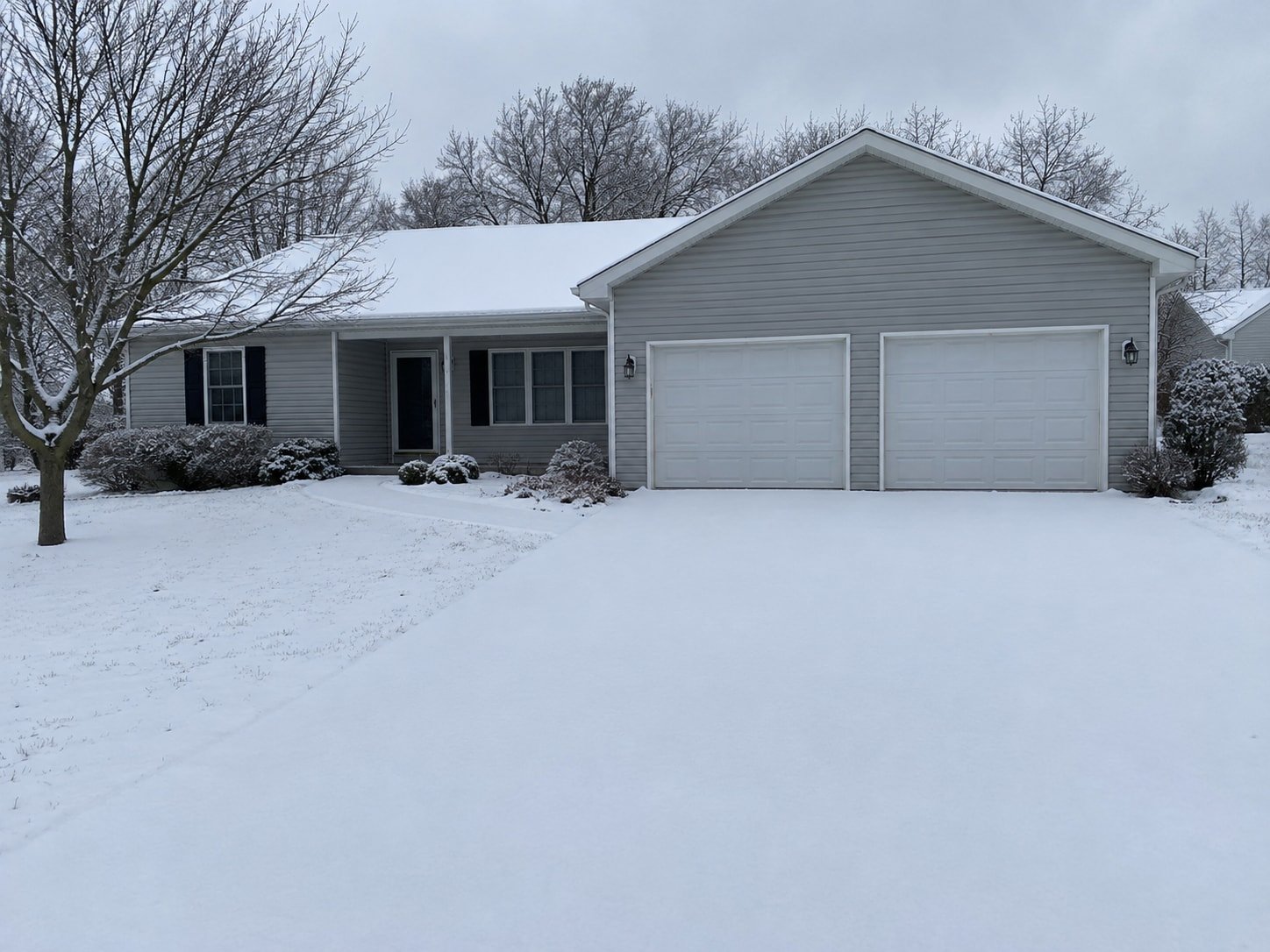 Representative residential snow plowing site before the work.