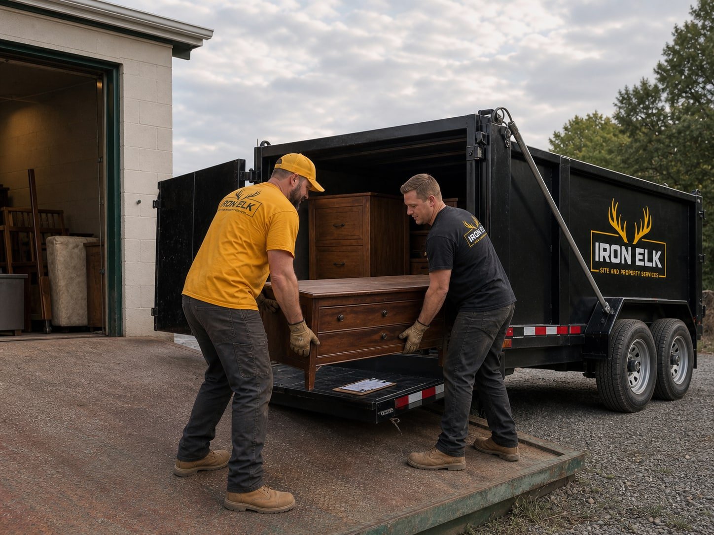 Furniture being unloaded at a donation center dock.