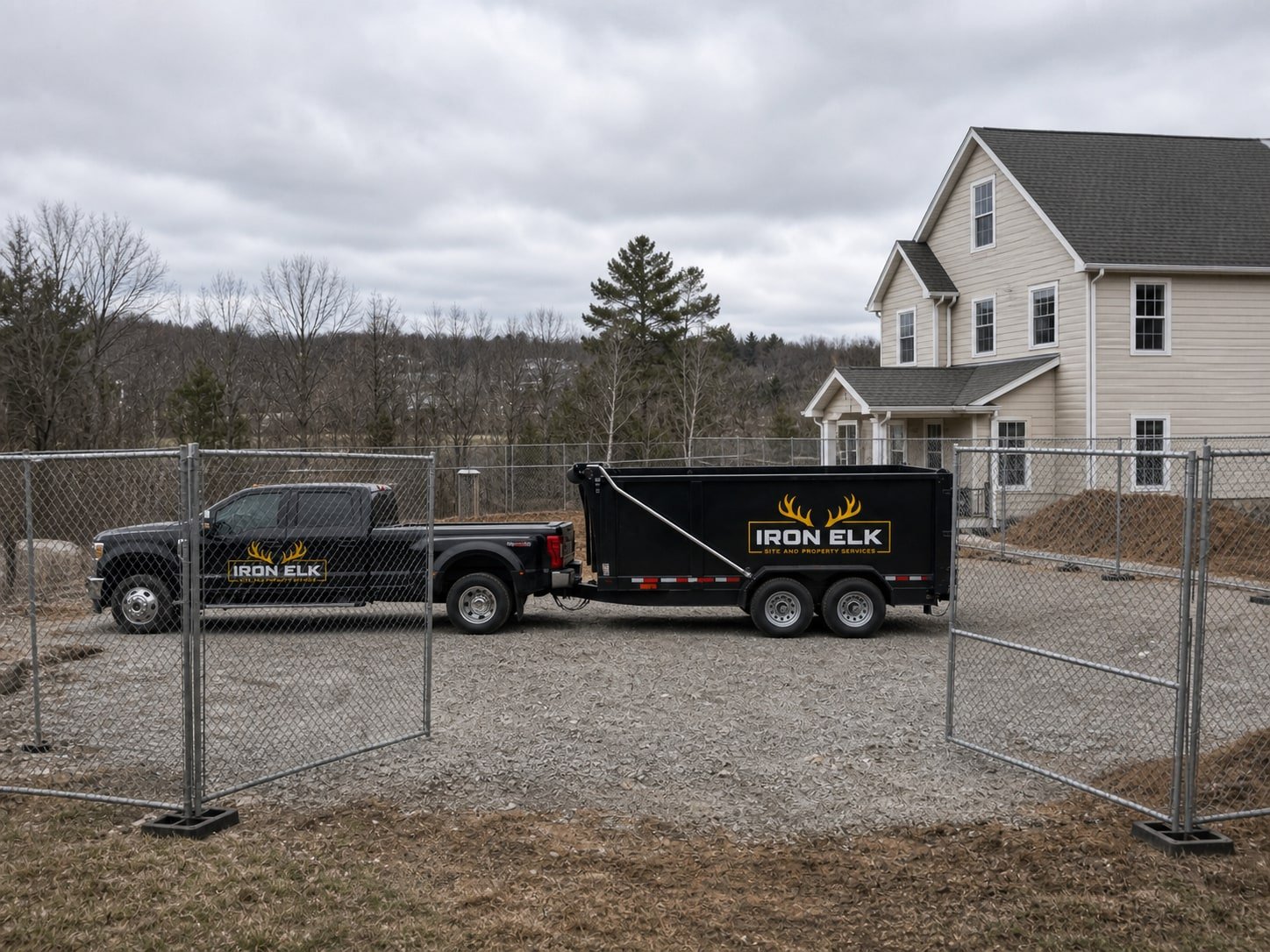 Temporary fence panels ringing a job site.